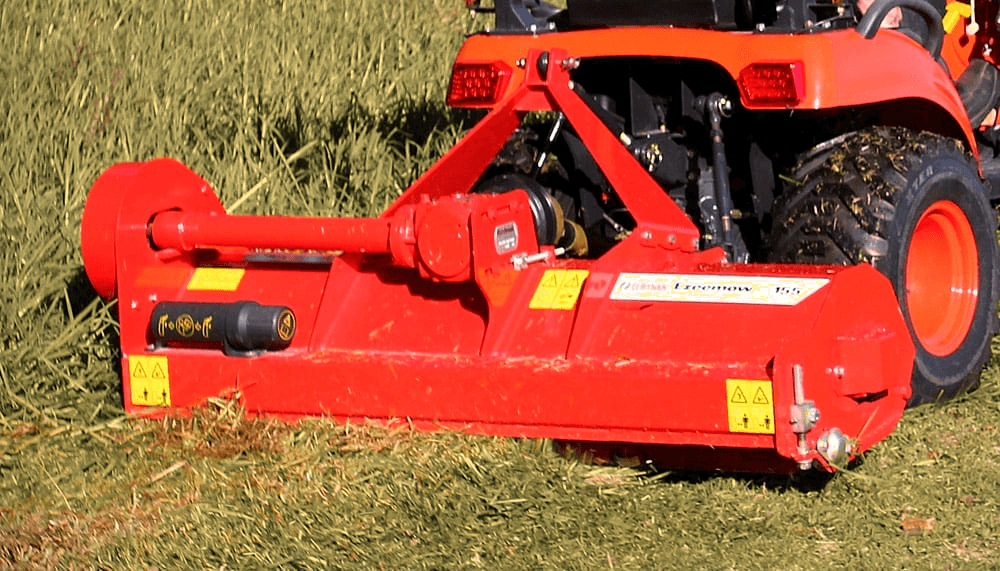 Kubota MX5200 tractor with Trimax Ezeemow FX 185 flail mower for hire in North Canterbury New Zealand